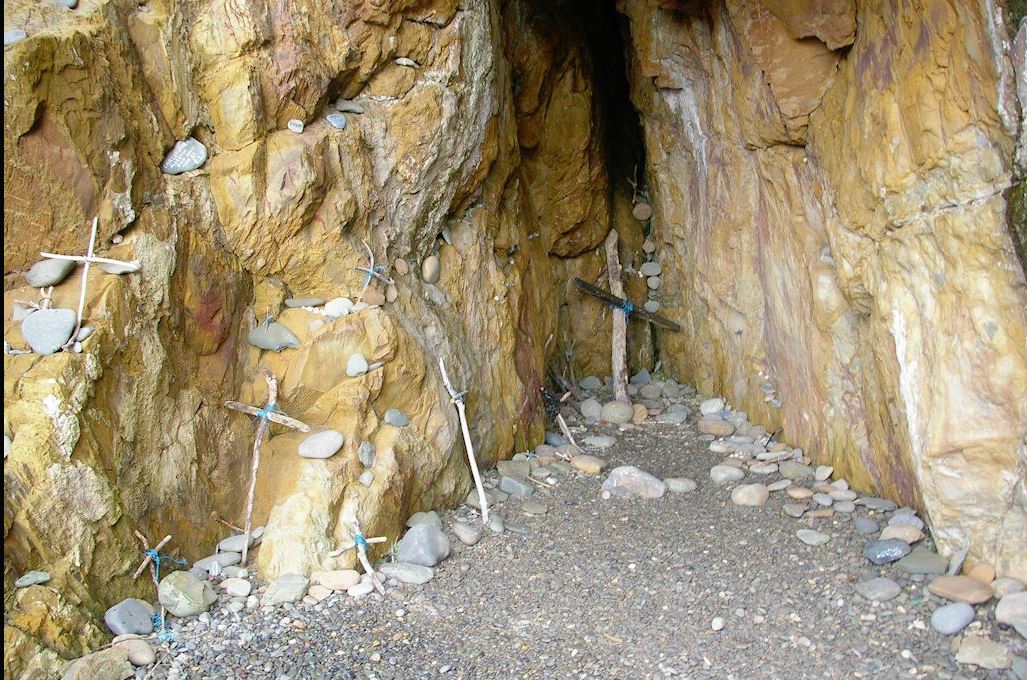 st ninian's cave with pilgrims driftwood crosses