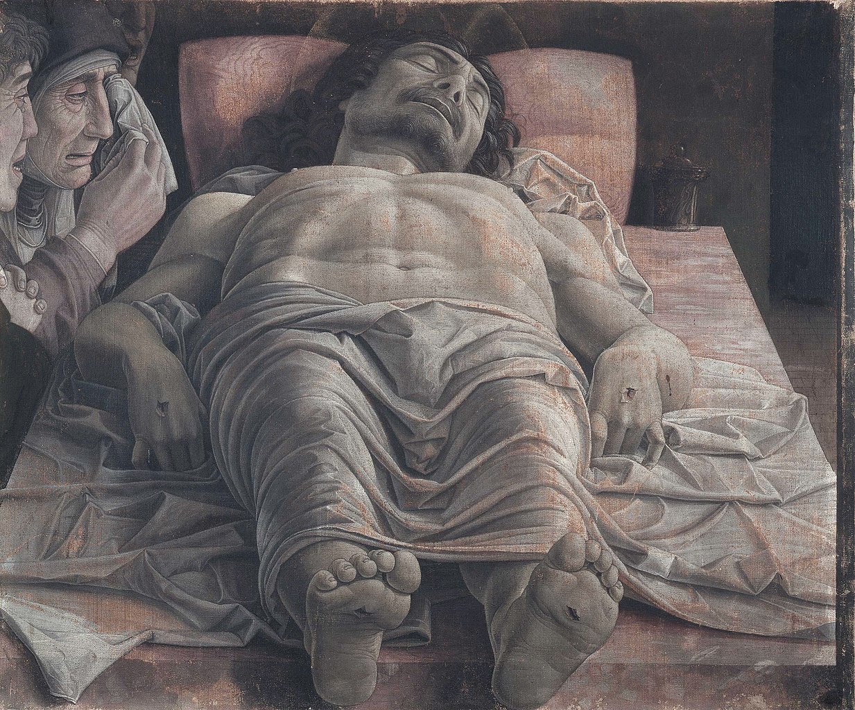 1233px-The_dead_Christ_and_three_mourners,_by_Andrea_Mantegna